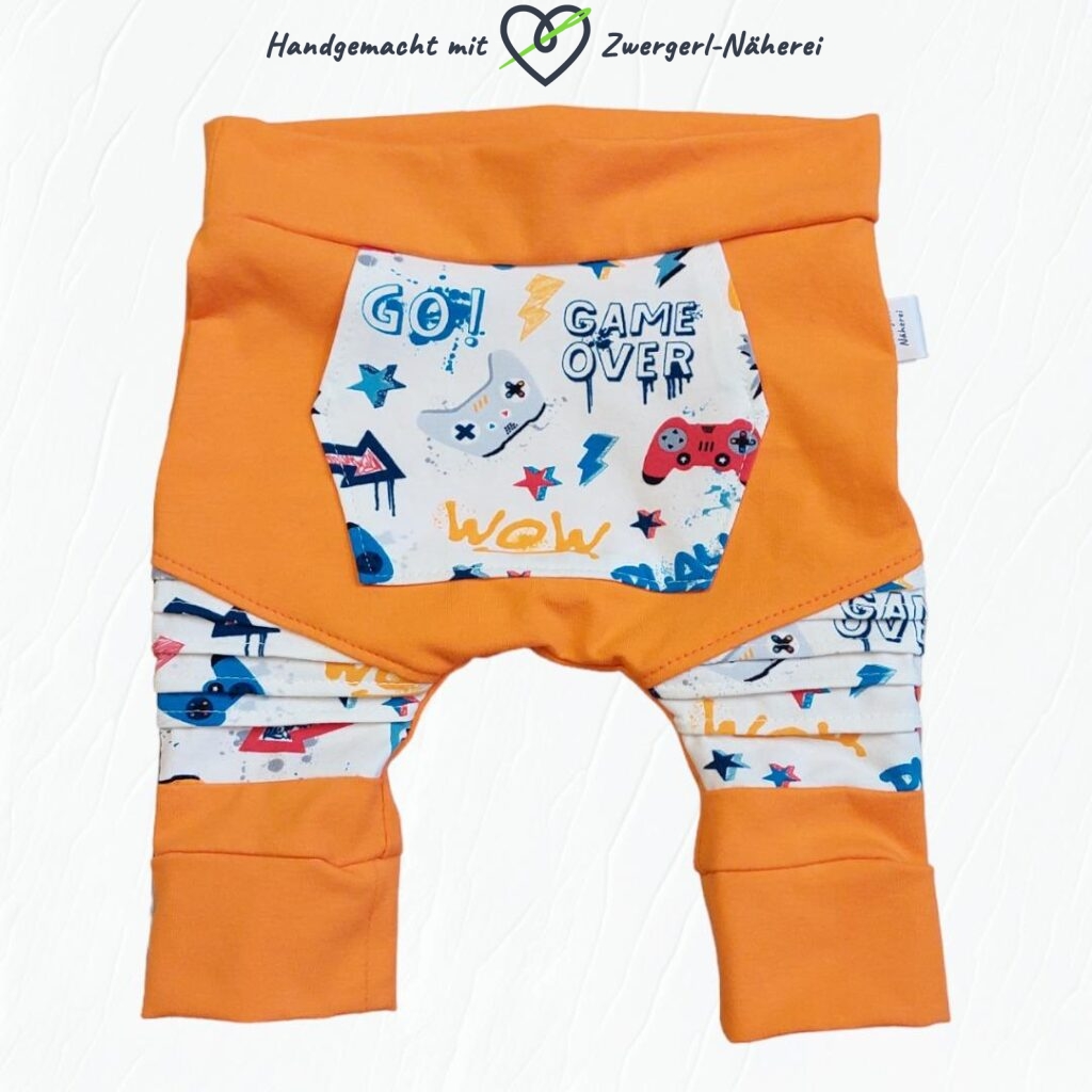 Hose Orange mit Gaming-Akzenten und Raffung aus Bio-Baumwolle in Top handmade Qualität